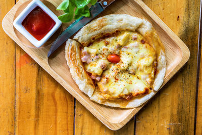 High angle view of pizza on table