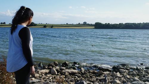 Woman standing in lake