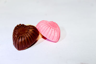 Close-up of cake against white background