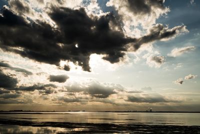 Scenic view of sea against sky at sunset