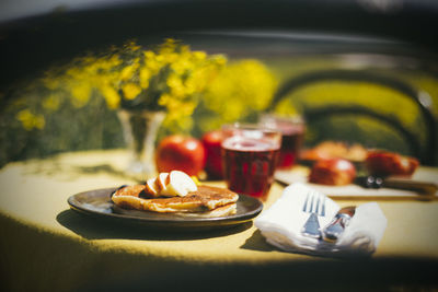 Close-up of food served on table