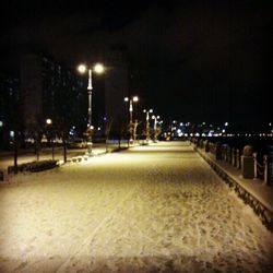 Illuminated street light at night