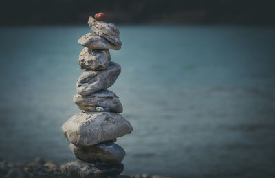 Close-up of stone stack on rock