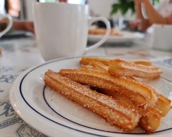 Close-up of breakfast served on table