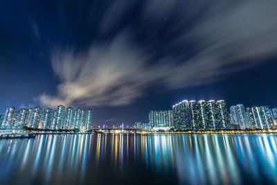 Buildings with sea reflection at night