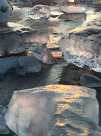 Rocks in water during winter