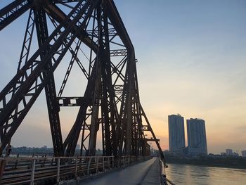View of bridge against cloudy sky