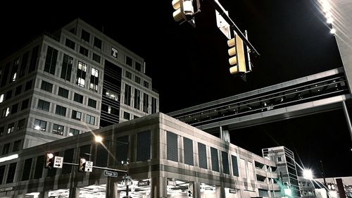 Low angle view of modern building at night