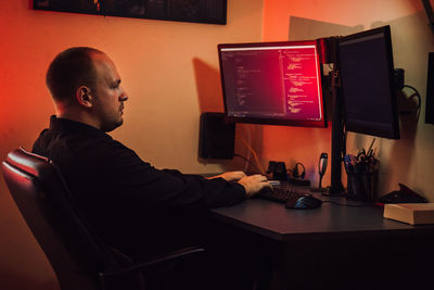 Man working on computers