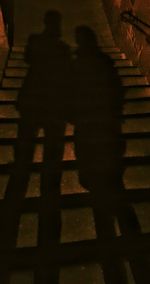 Shadow of people on steps