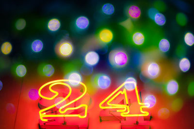 Close-up of illuminated numbers at night