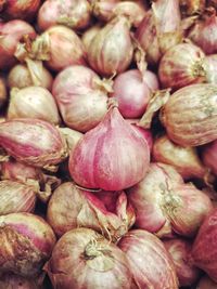 Full frame shot of onions for sale at market stall