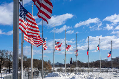 Low angle view of flag against sky