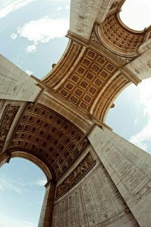 architecture, built structure, low angle view, building exterior, famous place, history, sky, travel destinations, tourism, international landmark, arch, travel, architectural feature, capital cities, cloud - sky, place of worship, religion, architectural column, tower, day