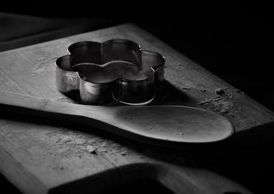 Close-up of old tea cup on table