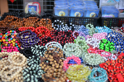 Close-up of bracelets for sale in market