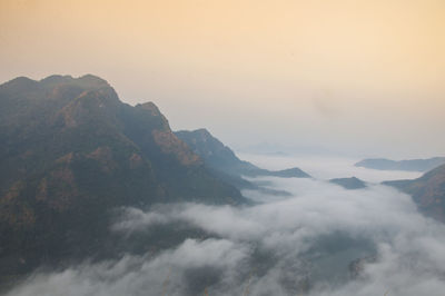 Scenic view of mountains against sky during sunset