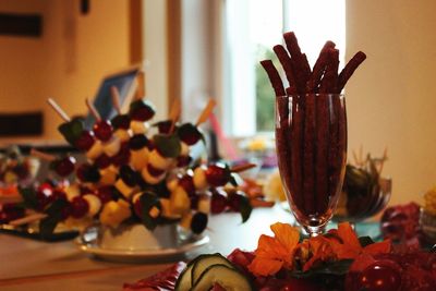 Close-up of fruits on table at home