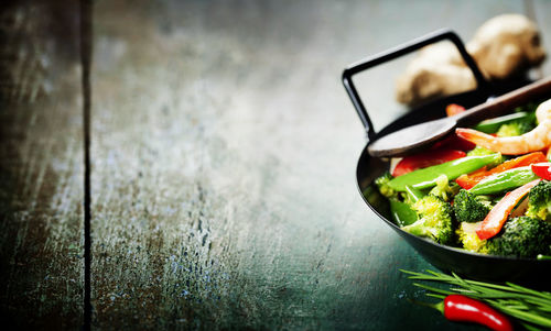 Close-up of chopped vegetables in bowl on table