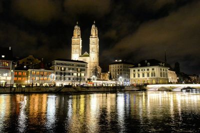 Illuminated buildings at waterfront