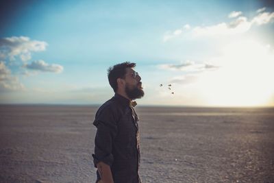 Woman standing on beach