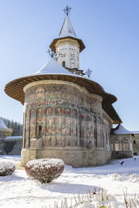 Traditional building against clear sky during winter