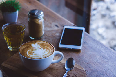 Coffee cup on table