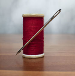 Close-up of thread on table