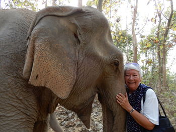 A quiet moment with my new friend in mandalao sanctuary for elephants near luang prabang, laos.