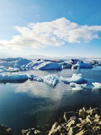Scenic view of sea against sky during winter