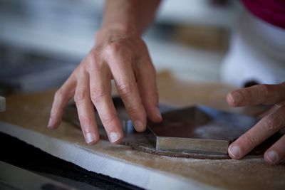 Preparing homemade christmas gingerbread houses