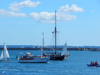 Boats sailing in sea