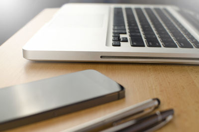 Close-up of laptop on table