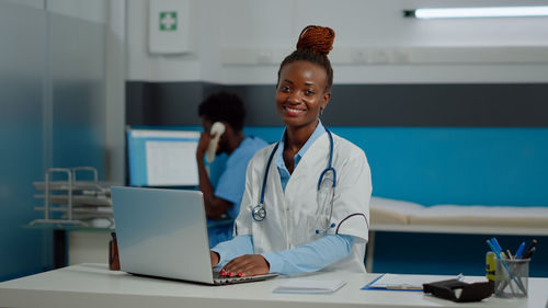 Portrait of female doctor in clinic