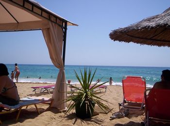 Scenic view of beach against sky