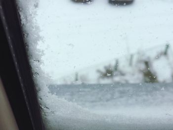 Close-up of wet window in rainy season