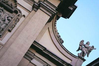 Low angle view of statue against sky