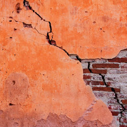 Full frame shot of weathered brick wall