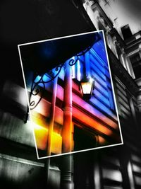 High angle view of illuminated lighting equipment on black background