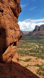 Scenic view of rock formation against sky