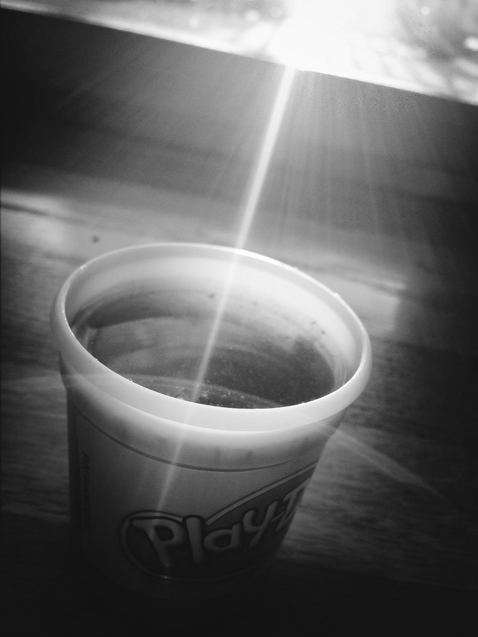 indoors, sunlight, table, sun, no people, reflection, close-up, sunbeam, high angle view, circle, lens flare, still life, day, auto post production filter, drink, shadow, empty, sky, nature