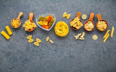 Directly above view of uncooked pasta on table