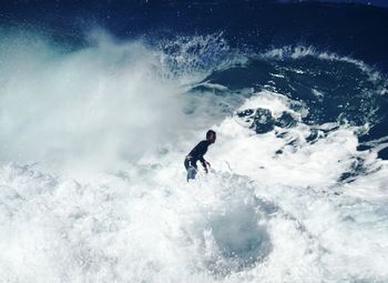 Man surfing in sea