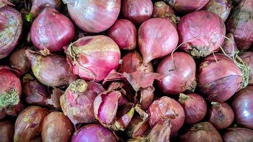 Full frame shot of onions for sale at market stall