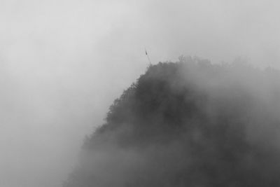 Low angle view of fog against sky