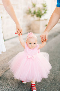 High angle of view of girl with pink dress