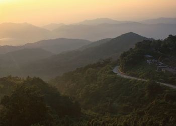 Scenic view of mountains against sky during sunset