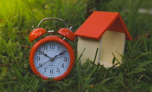 Close-up of clock on field