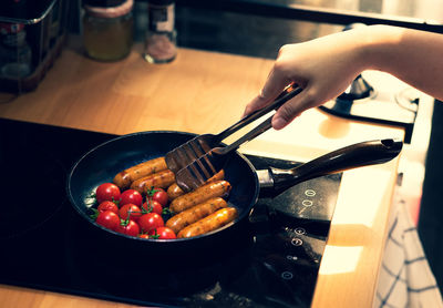 High angle view of person preparing food in kitchen