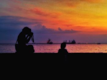 Scenic view of sea at sunset